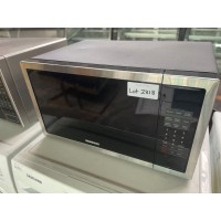 SAMSUNG STAINLESS STEEL/BLACK 28 LITRE 1000 WATT MICROWAVE (PRODUCT:ME6104ST1) SOLD AS IS - COMES WITH 30 DAYS WARRANTY FROM THE DATE OF PURCHASE SN:119212